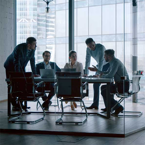 Tower MSA providers in meeting room working on settlement